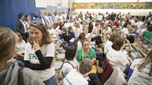 Burlington teachers rallying for raises in the Edmunds Middle School cafeteria August 31