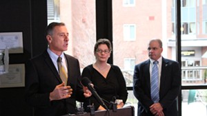 Former governor Peter Shumlin (left) with top health care staffers, Robin Lunge and Lawrence Miller