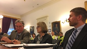 Public Utility Commission staff attorney John Cotter, PUC member Margaret Cheney and utilities analyst Tom Knauer testify before the Legislative Committee on Administrative Rules.