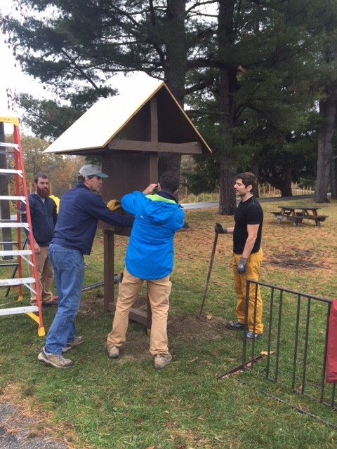 Members of CRAG-VT help install a new sign-in kiosk at Rock Point. - COURTESY CRAG-VT