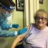 Helen Porter Rehabilitation and Nursing resident Elsie Johnson gets vaccinated on Monday.