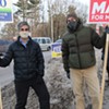 Candidates Miro Weinberger (left) and Max Tracy at a honk-and-wave Friday evening
