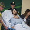 Bourgoin Discharged From Hospital, Held in Prison